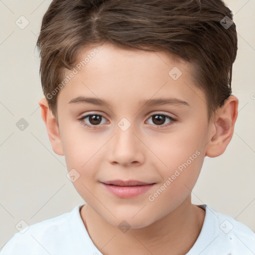 Joyful white child male with short  brown hair and brown eyes