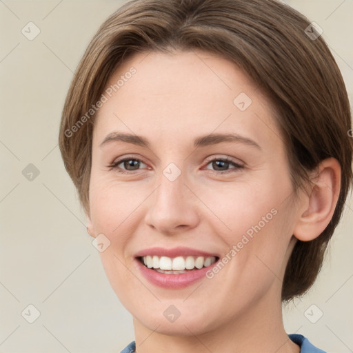 Joyful white young-adult female with medium  brown hair and grey eyes