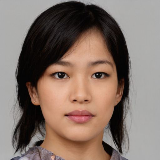 Neutral asian young-adult female with medium  black hair and brown eyes