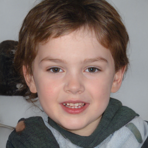 Joyful white child male with medium  brown hair and brown eyes