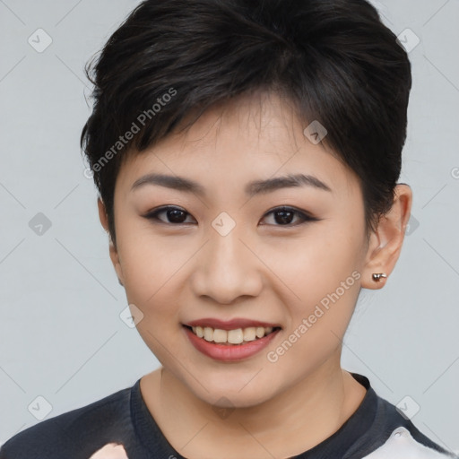 Joyful asian young-adult female with short  brown hair and brown eyes