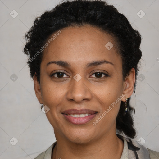 Joyful latino young-adult female with short  black hair and brown eyes