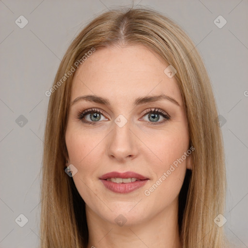 Joyful white young-adult female with long  brown hair and green eyes