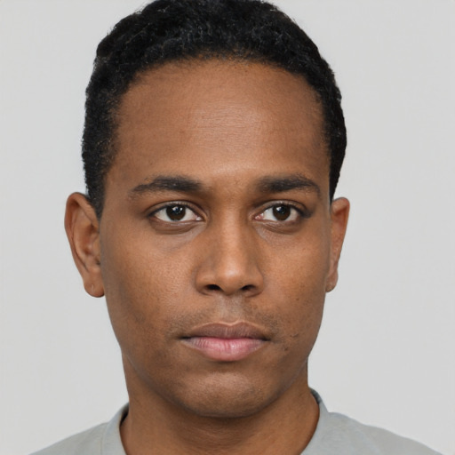 Neutral black young-adult male with short  black hair and brown eyes