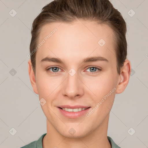 Joyful white young-adult female with short  brown hair and grey eyes