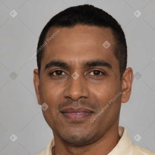 Joyful black young-adult male with short  black hair and brown eyes