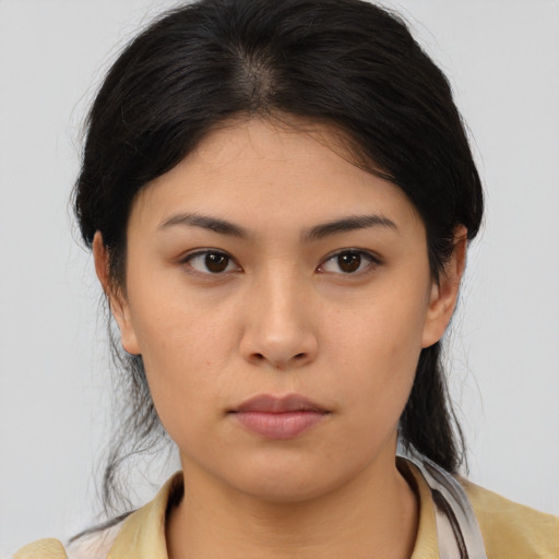 Neutral asian young-adult female with medium  brown hair and brown eyes