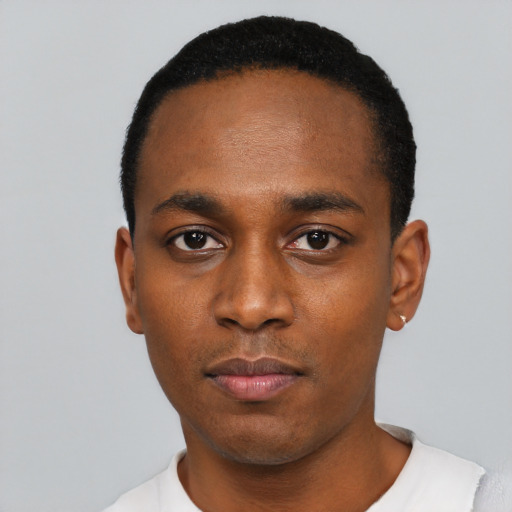 Neutral black young-adult male with short  black hair and brown eyes