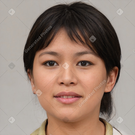 Joyful asian young-adult female with medium  brown hair and brown eyes