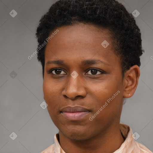Joyful black young-adult female with short  black hair and brown eyes
