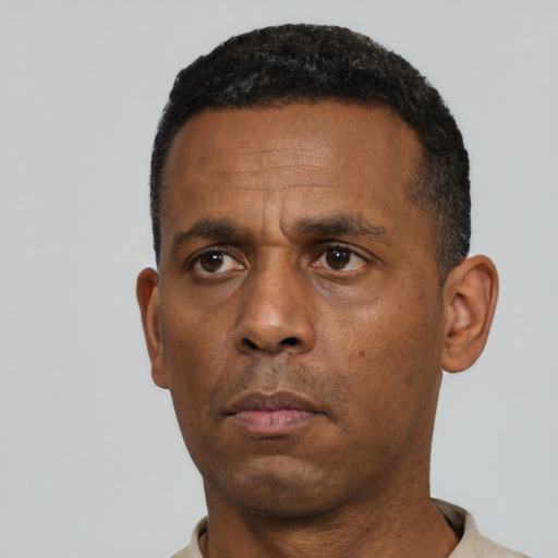 Neutral black adult male with short  black hair and brown eyes
