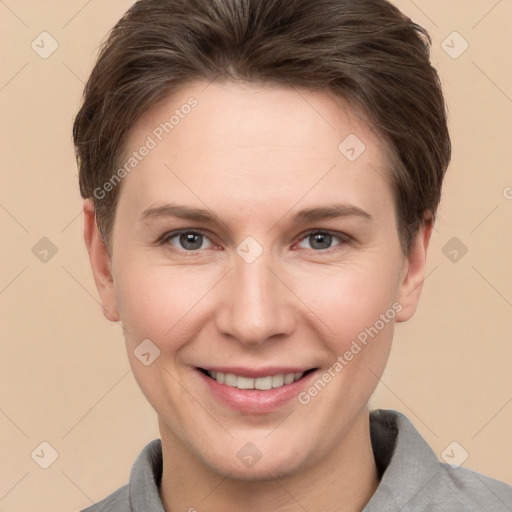 Joyful white adult female with short  brown hair and brown eyes