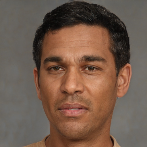 Neutral white adult male with short  black hair and brown eyes