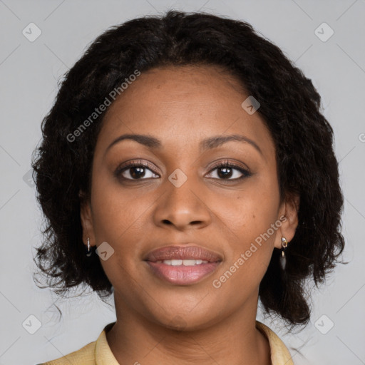 Joyful black young-adult female with medium  brown hair and brown eyes