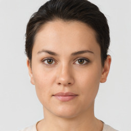 Neutral white young-adult female with short  brown hair and brown eyes