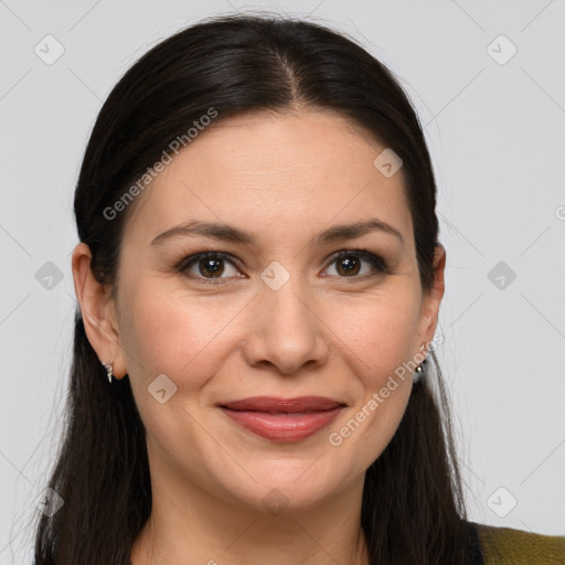 Joyful white young-adult female with long  brown hair and brown eyes