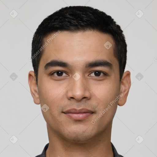 Joyful latino young-adult male with short  black hair and brown eyes