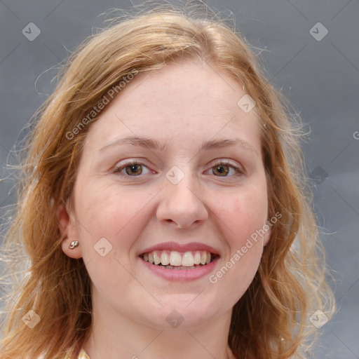 Joyful white young-adult female with medium  brown hair and blue eyes