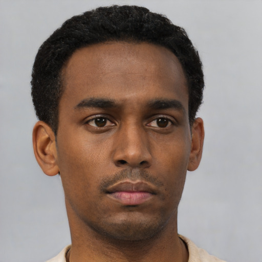 Neutral black young-adult male with short  black hair and brown eyes