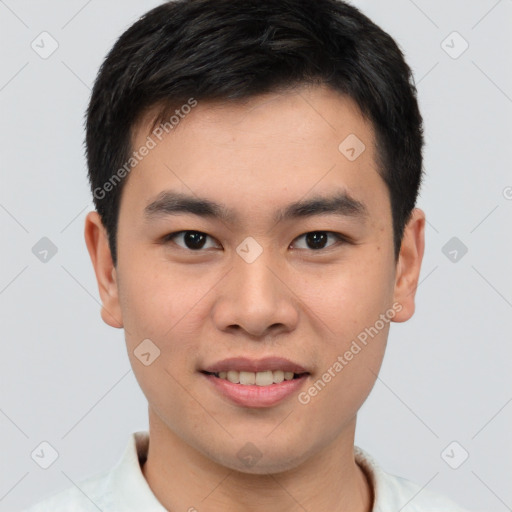 Joyful asian young-adult male with short  brown hair and brown eyes