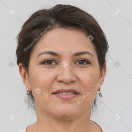 Joyful white adult female with short  brown hair and brown eyes