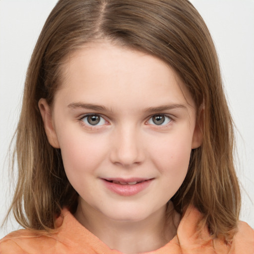 Joyful white child female with medium  brown hair and brown eyes