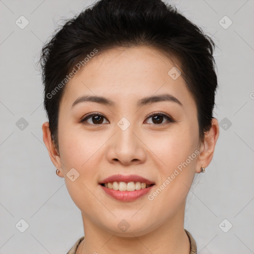 Joyful asian young-adult female with short  brown hair and brown eyes