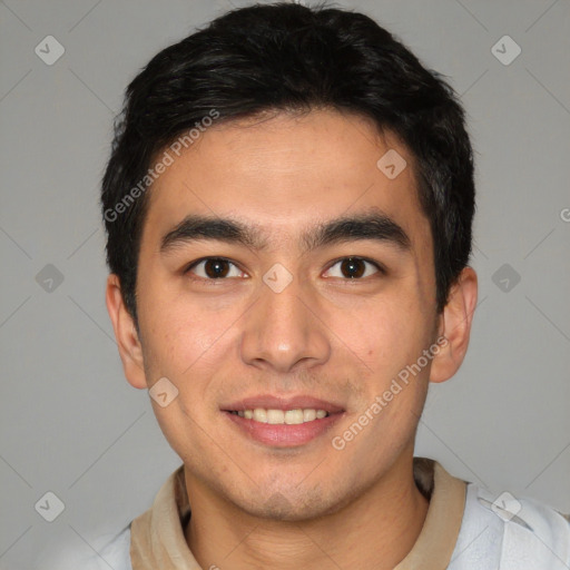 Joyful white young-adult male with short  black hair and brown eyes