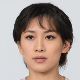 Neutral asian young-adult female with medium  brown hair and brown eyes