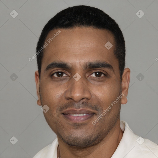 Joyful black young-adult male with short  black hair and brown eyes