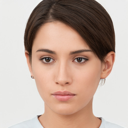 Neutral white young-adult female with short  brown hair and brown eyes