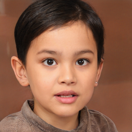 Joyful white child female with short  brown hair and brown eyes