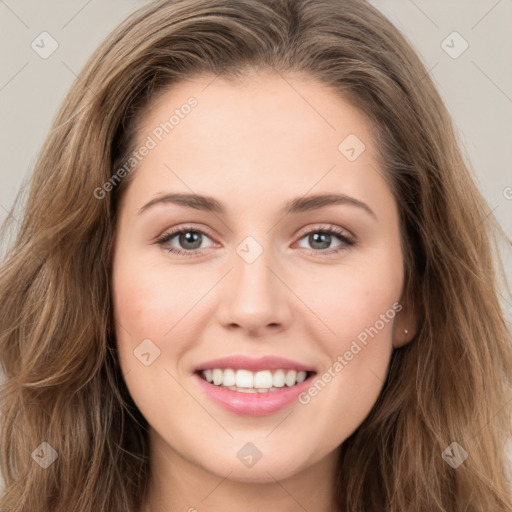 Joyful white young-adult female with long  brown hair and green eyes