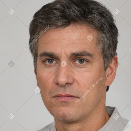 Neutral white adult male with short  brown hair and brown eyes