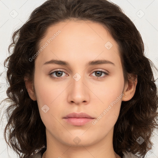 Neutral white young-adult female with long  brown hair and brown eyes