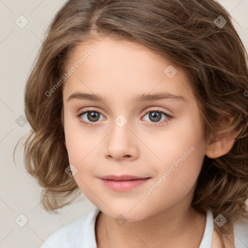 Joyful white child female with medium  brown hair and brown eyes