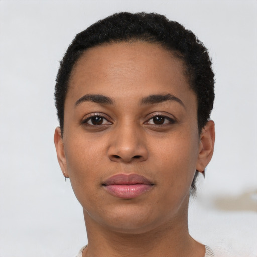 Neutral black young-adult female with short  brown hair and brown eyes