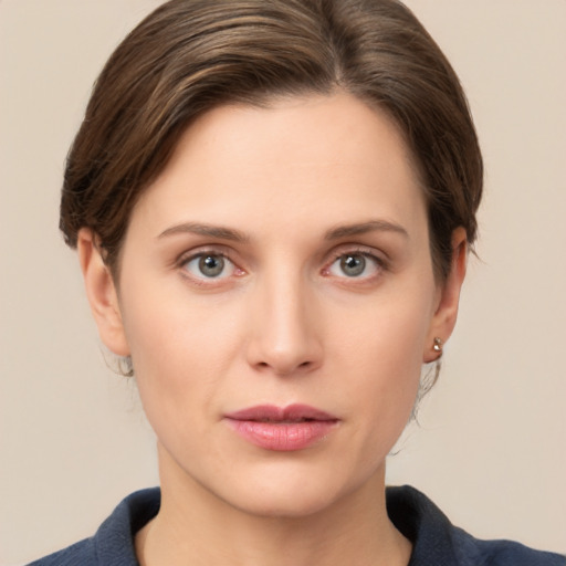 Neutral white young-adult female with short  brown hair and brown eyes