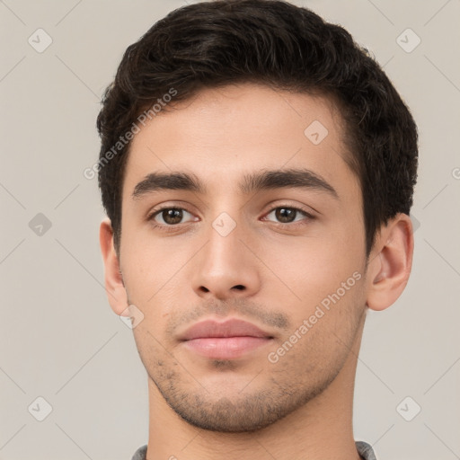 Neutral white young-adult male with short  brown hair and brown eyes