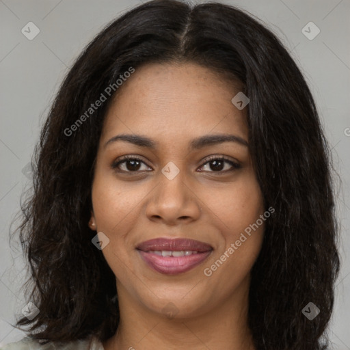 Joyful black young-adult female with long  brown hair and brown eyes