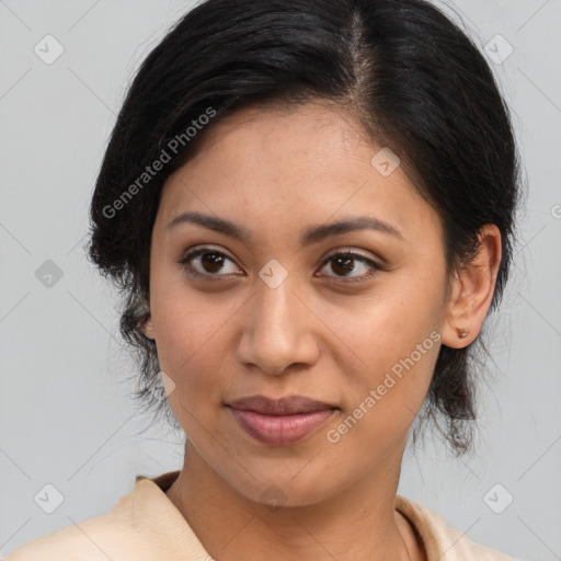 Joyful latino young-adult female with medium  brown hair and brown eyes