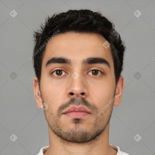 Neutral latino young-adult male with short  black hair and brown eyes