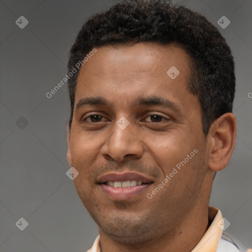 Joyful latino young-adult male with short  brown hair and brown eyes