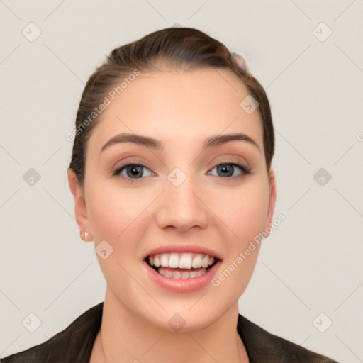 Joyful white young-adult female with long  brown hair and grey eyes