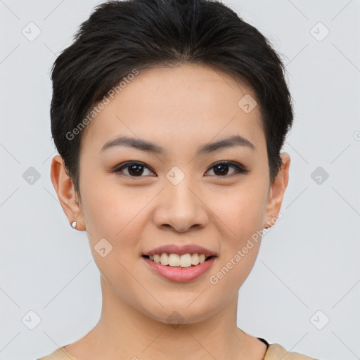 Joyful asian young-adult female with short  brown hair and brown eyes