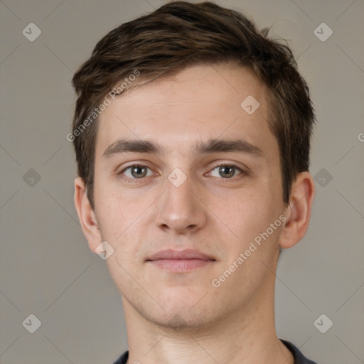 Neutral white young-adult male with short  brown hair and brown eyes