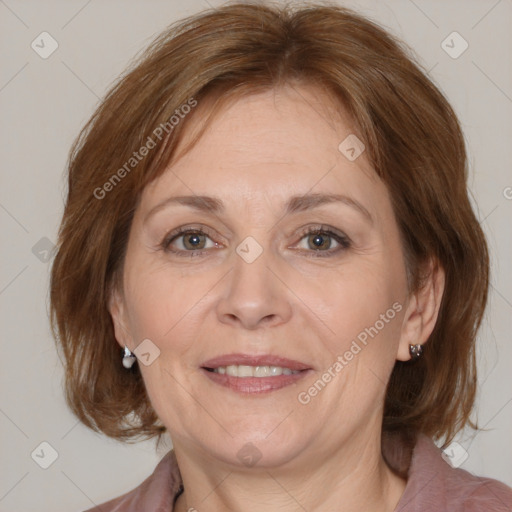 Joyful white adult female with medium  brown hair and brown eyes