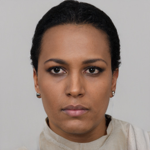 Neutral black young-adult female with short  black hair and brown eyes
