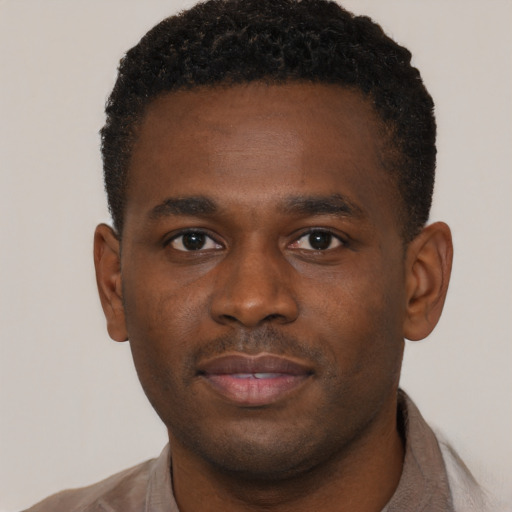 Neutral black young-adult male with short  brown hair and brown eyes