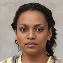 Neutral black young-adult female with short  brown hair and brown eyes